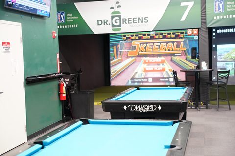 Pool table and skee-ball under bay 7 at Ashland